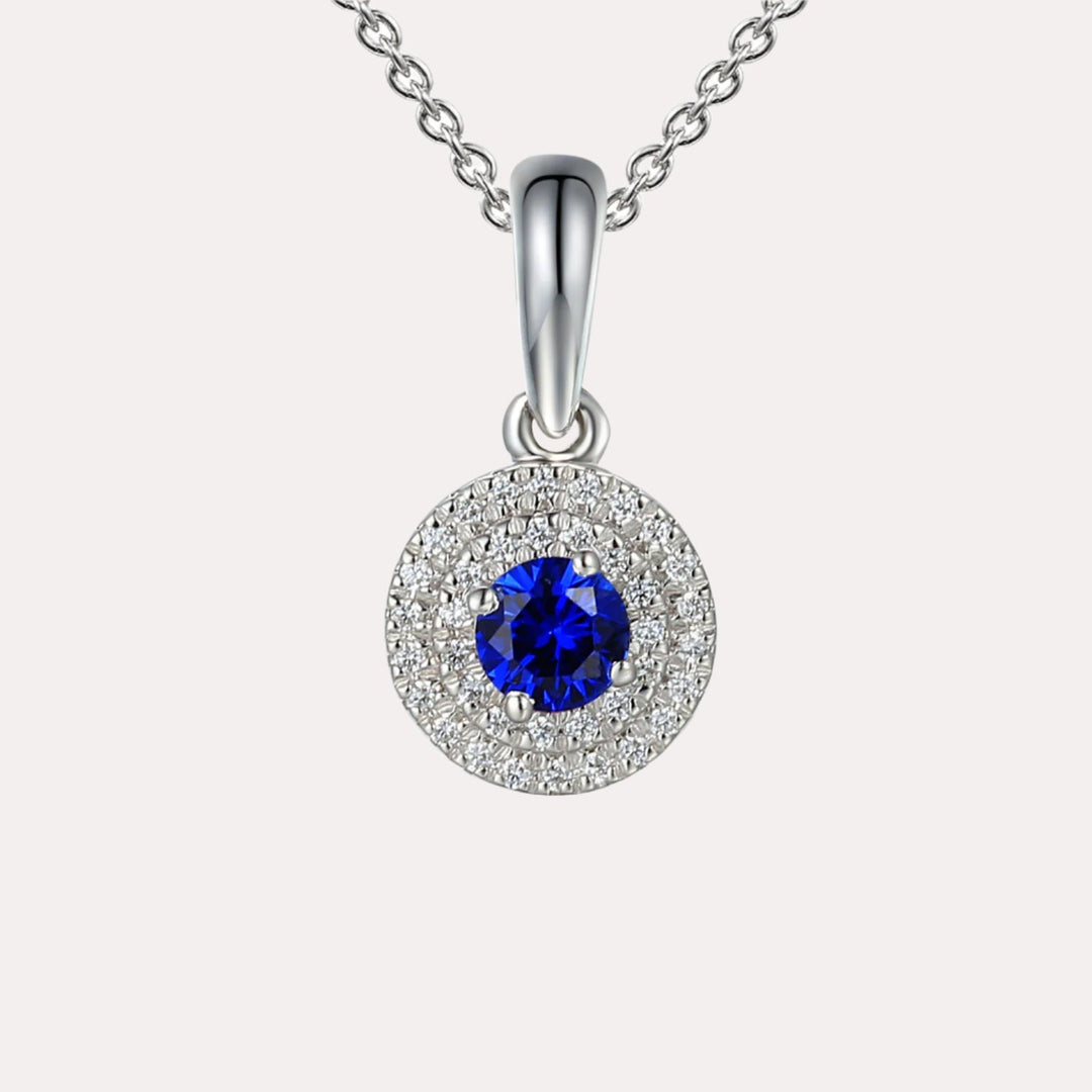 Blue Sapphire & Diamond Double Halo Pendant Necklace In 18K Gold - The Jewelyst. - Blue Sapphire & Diamond Double Halo Pendant Necklace In 18K Gold