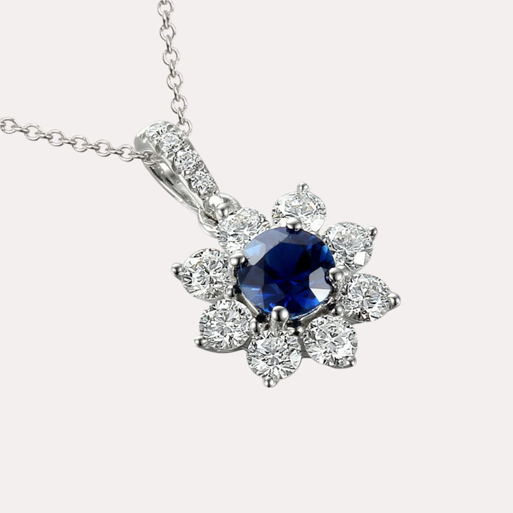Blue Sapphire & Diamond Halo Flower Pendant Necklace In 18K Gold - The Jewelyst. - Blue Sapphire & Diamond Halo Flower Pendant Necklace In 18K Gold