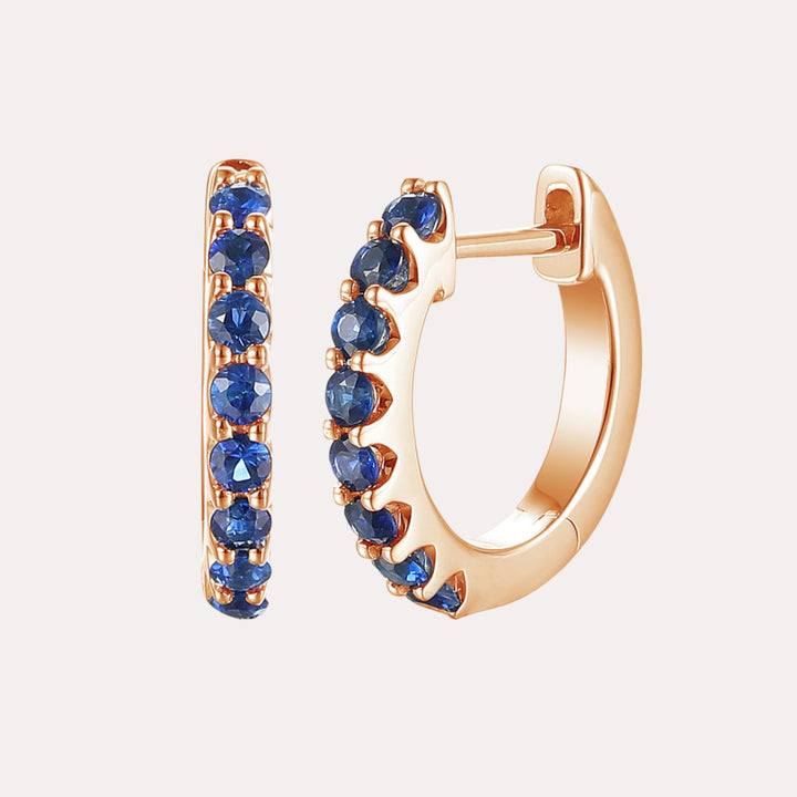Claw Set Blue Sapphire Huggies In 18K Gold - The Jewelyst. - Claw Set Blue Sapphire Huggies In 18K Gold