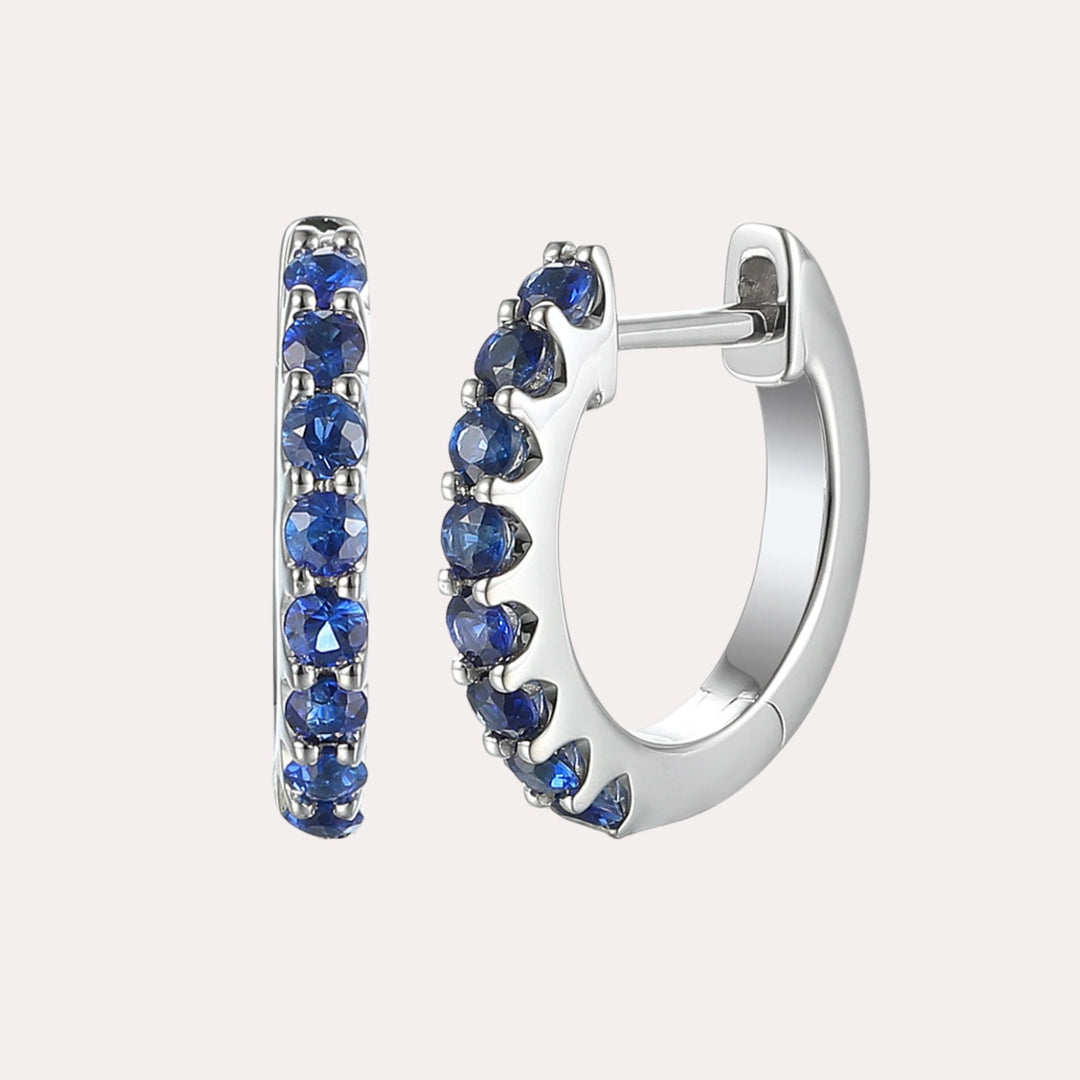 Claw Set Blue Sapphire Huggies In 18K Gold - The Jewelyst. - Claw Set Blue Sapphire Huggies In 18K Gold
