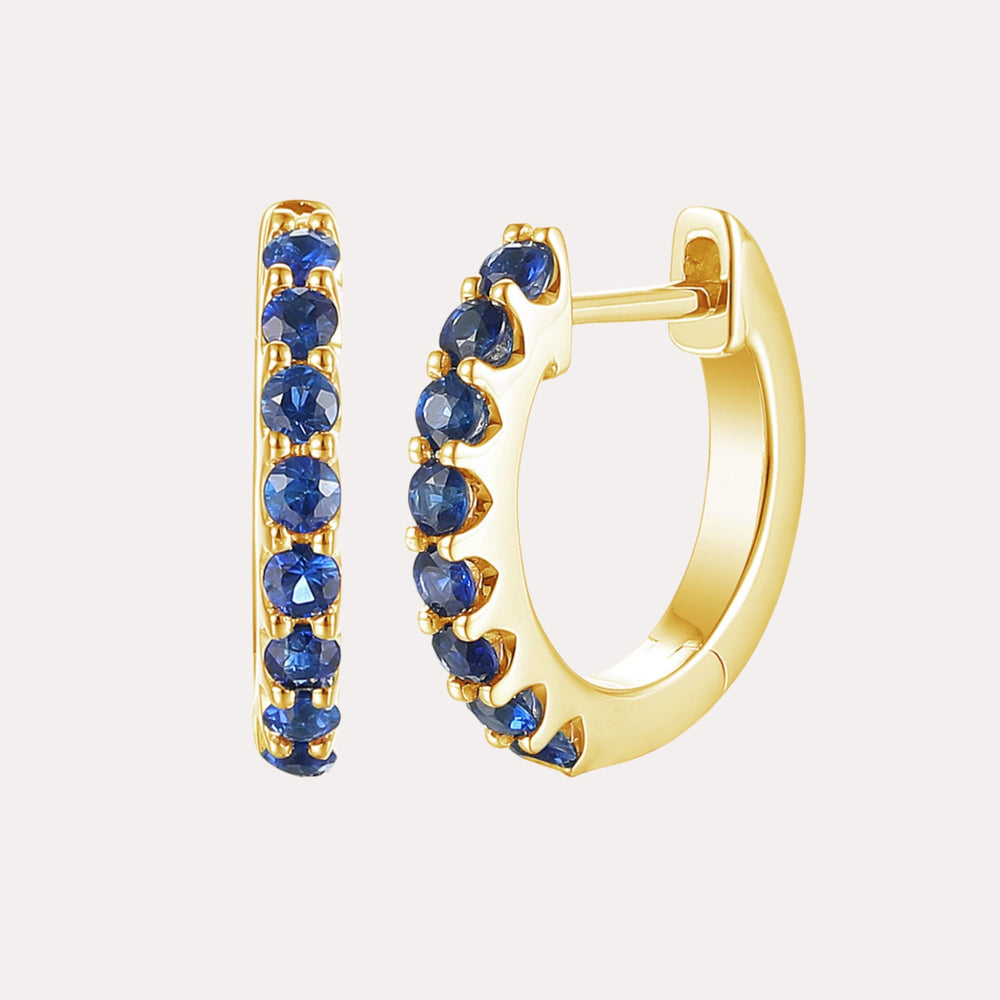 Claw Set Blue Sapphire Huggies In 18K Gold - The Jewelyst. - Claw Set Blue Sapphire Huggies In 18K Gold