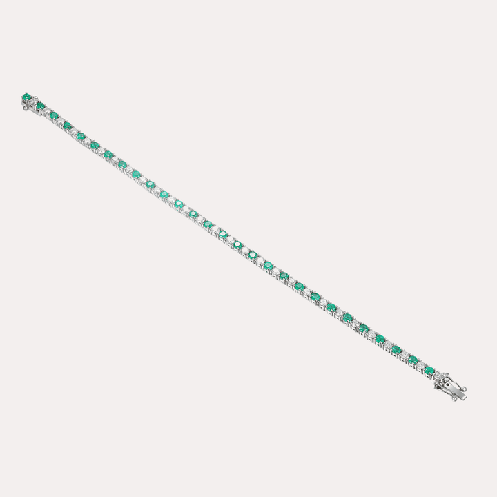 Emerald & Diamond Tennis Bracelet In 18K Gold - The Jewelyst. - Emerald & Diamond Tennis Bracelet In 18K Gold