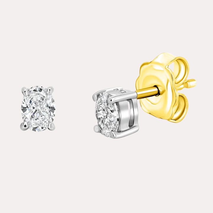 Oval 4 Claw Diamond Stud Earrings In 18K Gold - The Jewelyst. - Oval 4 Claw Diamond Stud Earrings In 18K Gold
