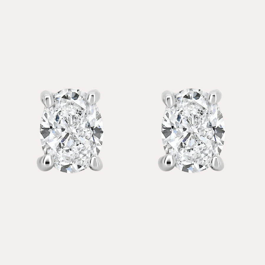 Oval 4 Claw Diamond Stud Earrings In 18K Gold - The Jewelyst. - Oval 4 Claw Diamond Stud Earrings In 18K Gold