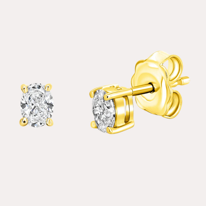 Oval 4 Claw Diamond Stud Earrings In 18K Gold - The Jewelyst. - Oval 4 Claw Diamond Stud Earrings In 18K Gold