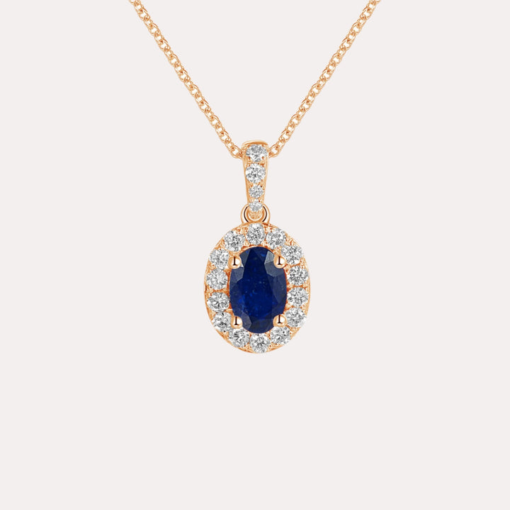 Oval Blue Sapphire & Diamond Halo Pendant Necklace In 18K Gold - The Jewelyst. - Oval Blue Sapphire & Diamond Halo Pendant Necklace In 18K Gold