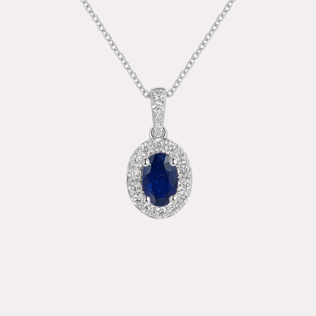 Oval Blue Sapphire & Diamond Halo Pendant Necklace In 18K Gold - The Jewelyst. - Oval Blue Sapphire & Diamond Halo Pendant Necklace In 18K Gold