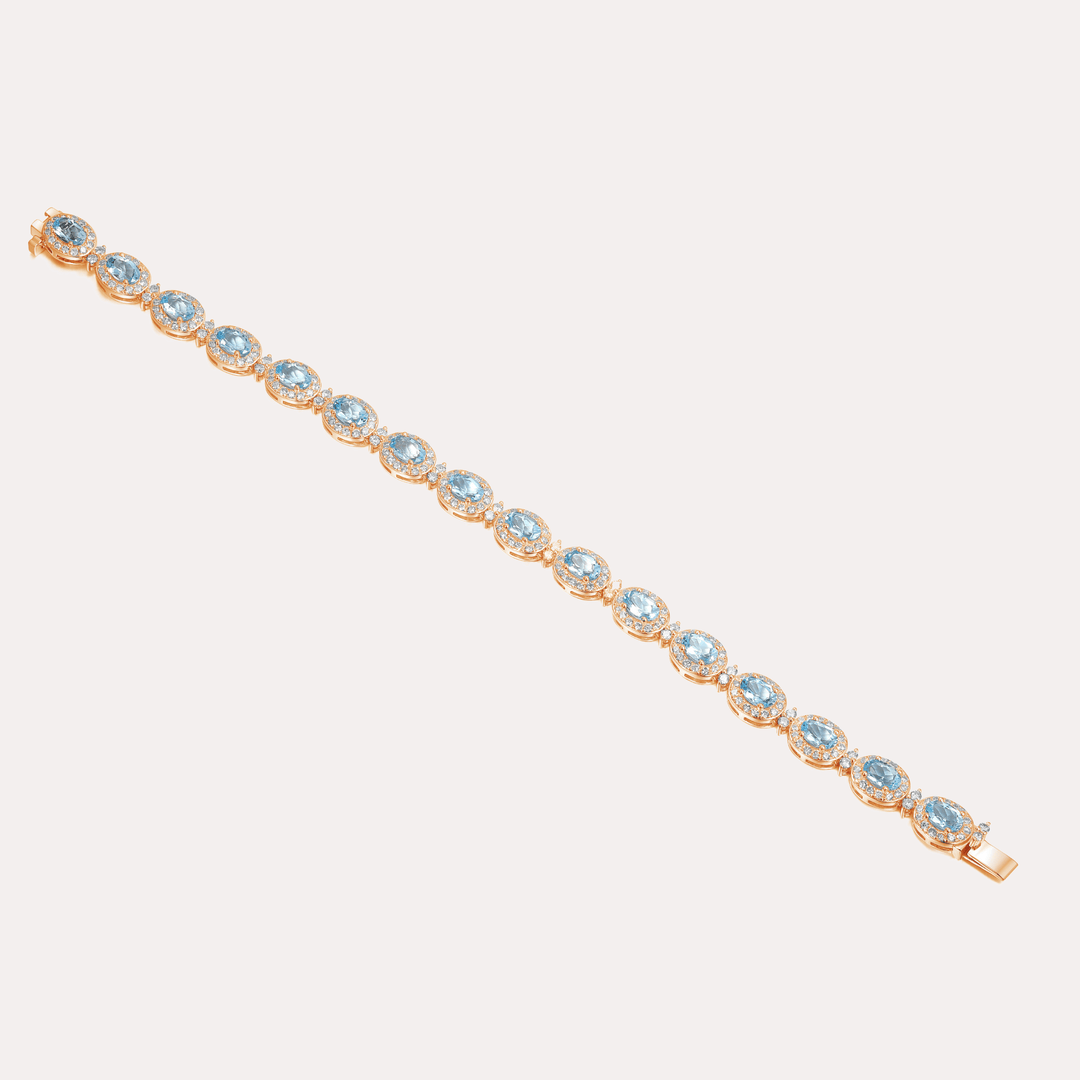 Oval Cut Aquamarine & Diamond Halo Tennis Bracelet In 18K Gold - The Jewelyst. - Oval Cut Aquamarine & Diamond Halo Tennis Bracelet In 18K Gold