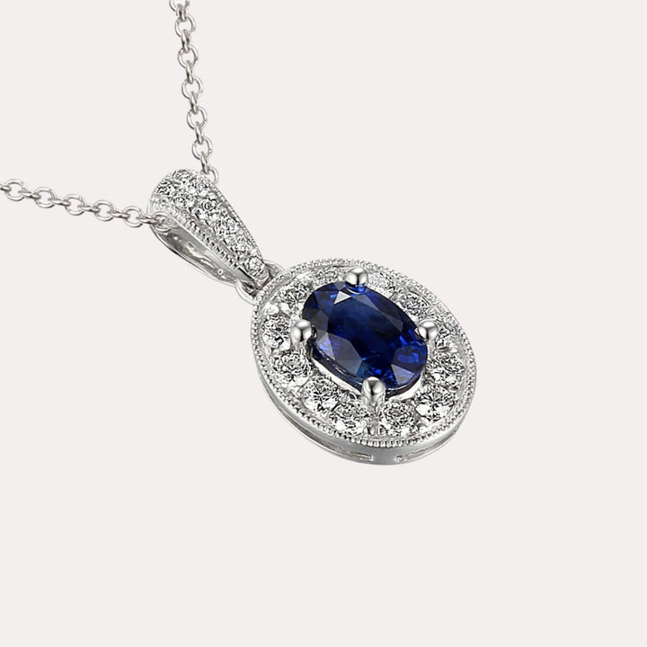 Oval Cut Blue Sapphire Halo Pendant Necklace In 18K Gold - The Jewelyst. - Oval Cut Blue Sapphire Halo Pendant Necklace In 18K Gold