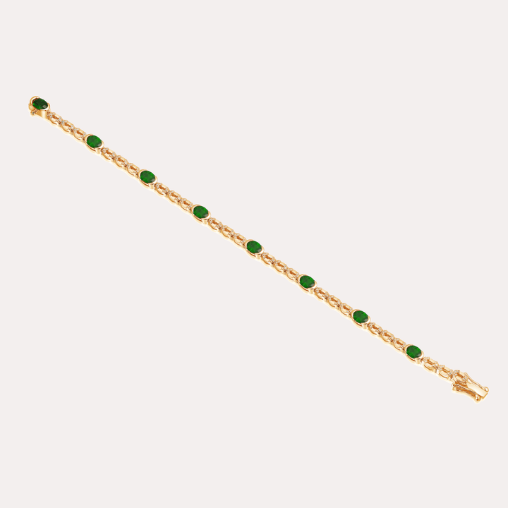 Oval Cut Emerald Rubover Set Tennis Bracelet In 18K Gold - The Jewelyst. - Oval Cut Emerald Rubover Set Tennis Bracelet In 18K Gold