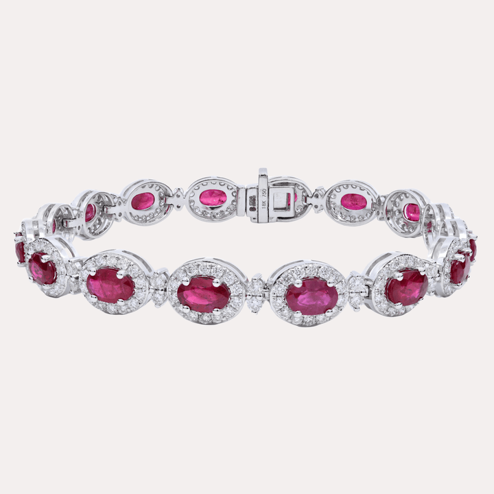 Oval Cut Ruby & Diamond Halo Tennis Bracelet In 18K Gold - The Jewelyst. - Oval Cut Ruby & Diamond Halo Tennis Bracelet In 18K Gold