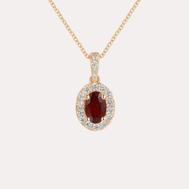 Oval Ruby & Diamond Halo Pendant Necklace In 18K Gold - The Jewelyst. - Oval Ruby & Diamond Halo Pendant Necklace In 18K Gold