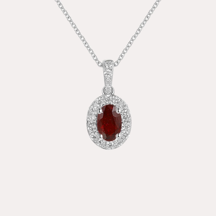 Oval Ruby & Diamond Halo Pendant Necklace In 18K Gold - The Jewelyst. - Oval Ruby & Diamond Halo Pendant Necklace In 18K Gold