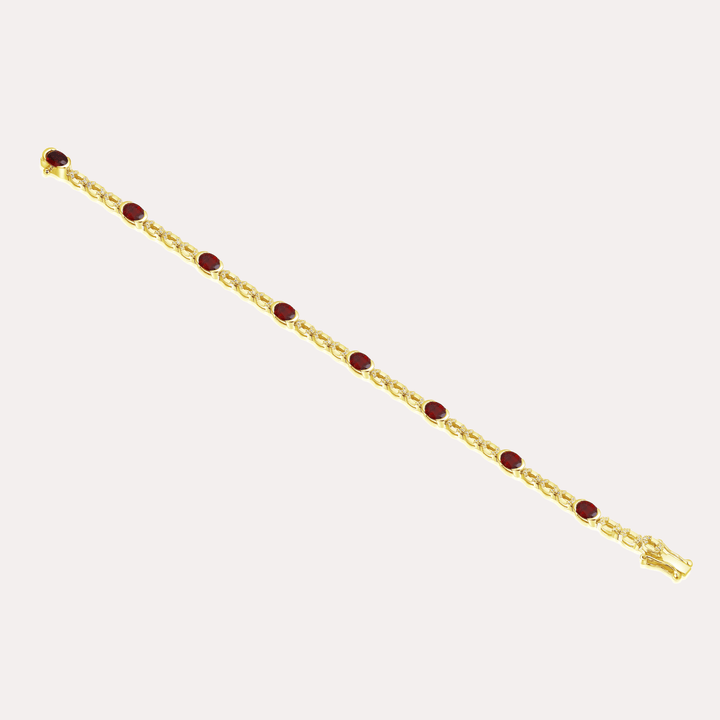 Oval Ruby Tennis Rubover Set Bracelet In 18K Gold - The Jewelyst. - Oval Ruby Tennis Rubover Set Bracelet In 18K Gold