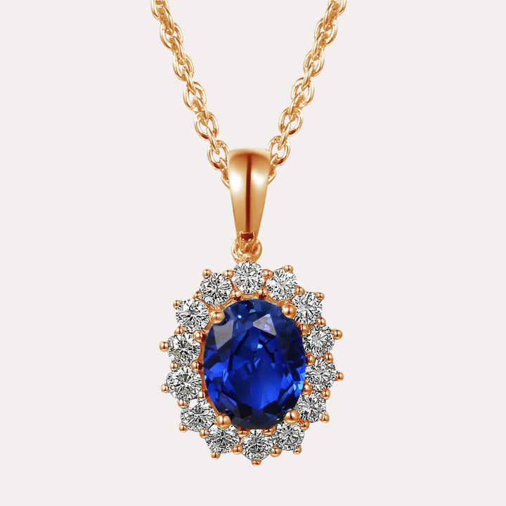 Oval Shape Blue Sapphire Halo Cluster Pendant Necklace In 18K Gold - The Jewelyst. - Oval Shape Blue Sapphire Halo Cluster Pendant Necklace In 18K Gold
