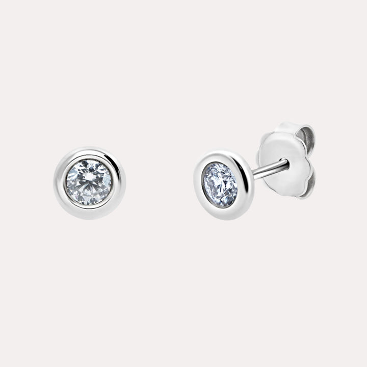 Rimset Round Brilliant Cut Rubover Stud Earrings - The Jewelyst. - Rimset Round Brilliant Cut Rubover Stud Earrings