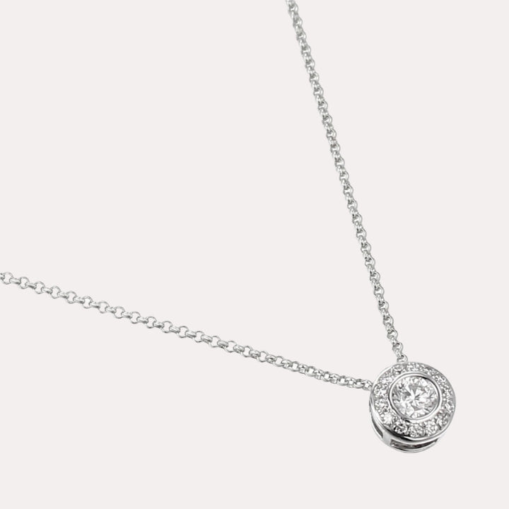 Round Brilliant Rubover Set Diamond Halo Pendant Necklace In 18K Gold - The Jewelyst. - Round Brilliant Rubover Set Diamond Halo Pendant Necklace In 18K Gold