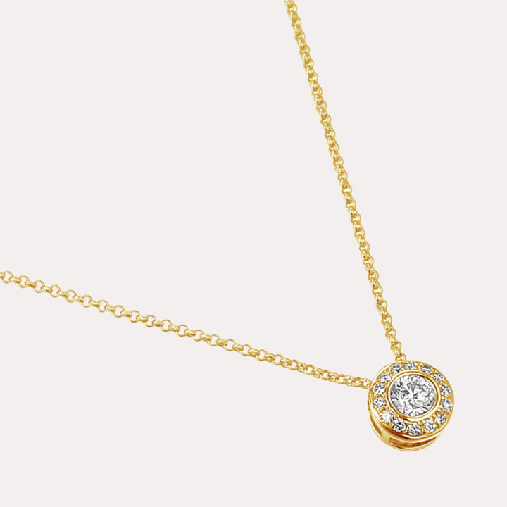 Round Brilliant Rubover Set Diamond Halo Pendant Necklace In 18K Gold - The Jewelyst. - Round Brilliant Rubover Set Diamond Halo Pendant Necklace In 18K Gold