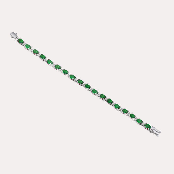 Oval Blue Sapphire & Round Brilliant Cut Tennis Bracelet In 18K Gold