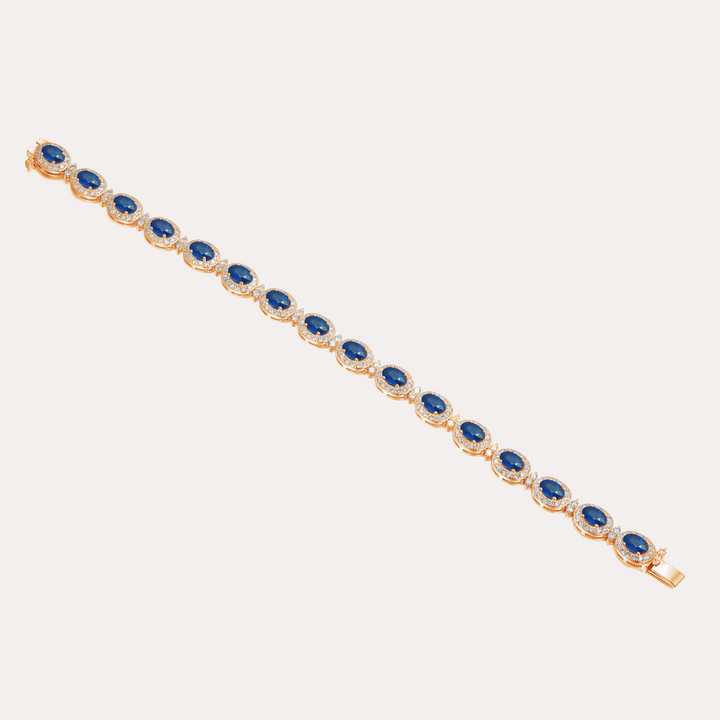 Oval Cut Blue Sapphire & Diamond Halo Tennis Bracelet In 18K Gold