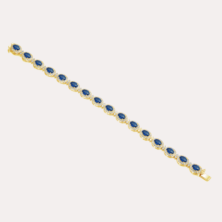 Oval Cut Blue Sapphire & Diamond Halo Tennis Bracelet In 18K Gold