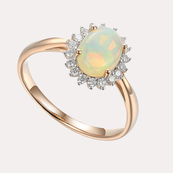 Oval Opal With Round Brilliant Cut Diamond Cluster Halo Ring