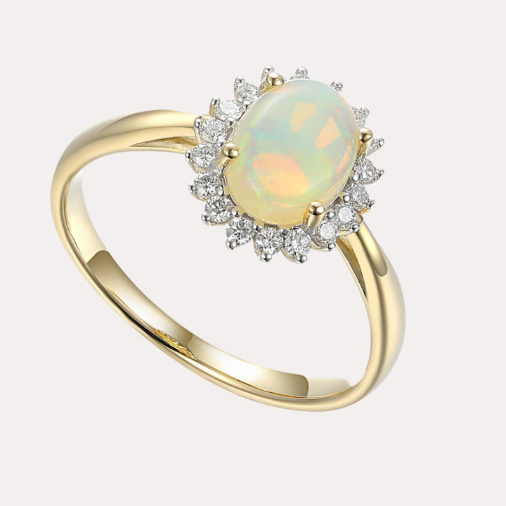 Oval Opal With Round Brilliant Cut Diamond Cluster Halo Ring