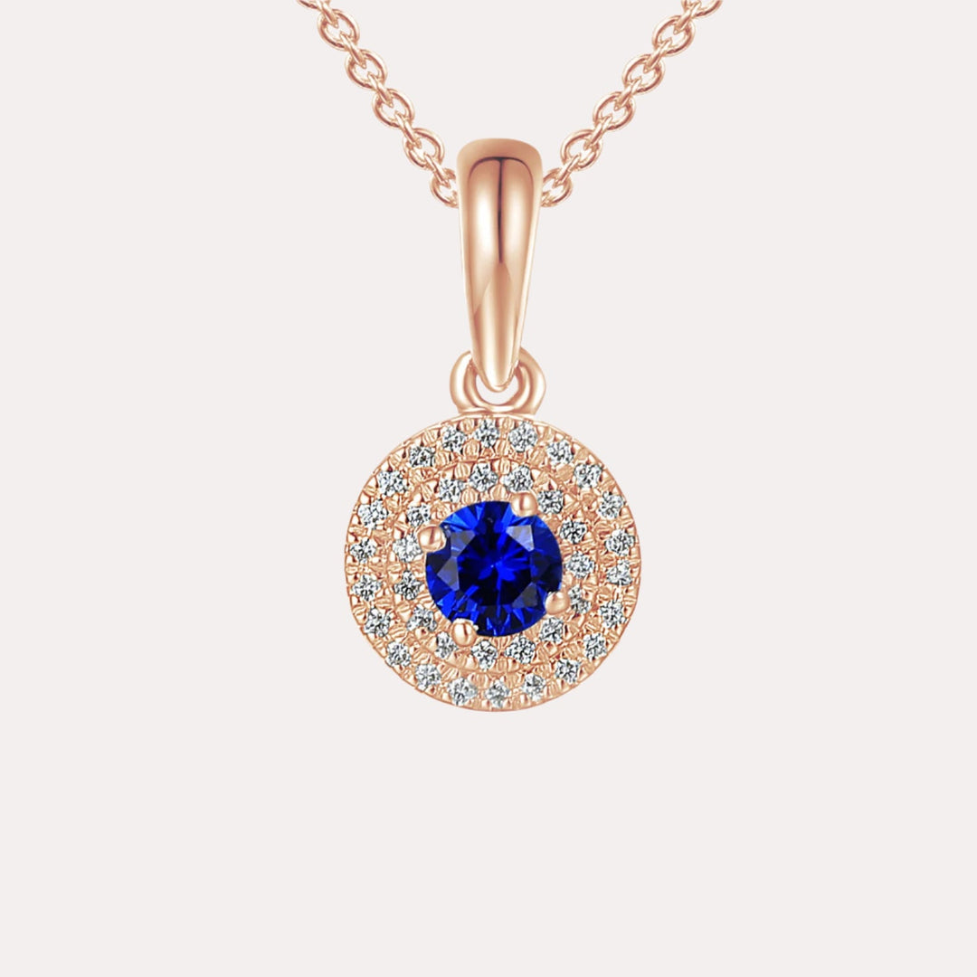 Blue Sapphire and diamond double halo pendant necklace in 18K rose gold