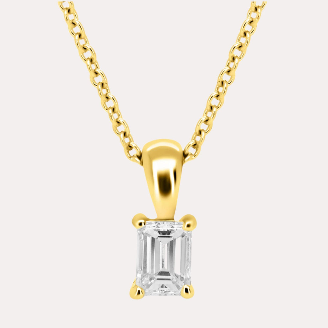 Emerald Cut Solitaire Diamond Pendant Necklace In 18K Yellow Gold