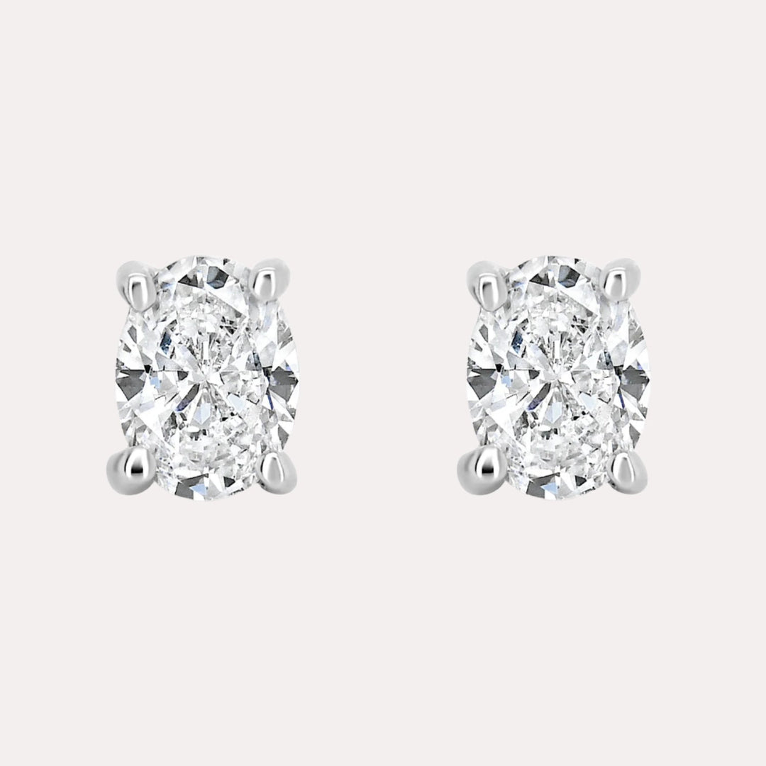 Oval 4 Claw Diamond Stud Earrings In 18K Gold - The Jewelyst. - Oval 4 Claw Diamond Stud Earrings In 18K Gold