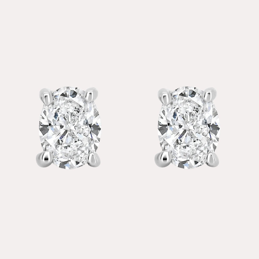 Oval 4 Claw Diamond Stud Earrings In 18K Gold - The Jewelyst. - Oval 4 Claw Diamond Stud Earrings In 18K Gold