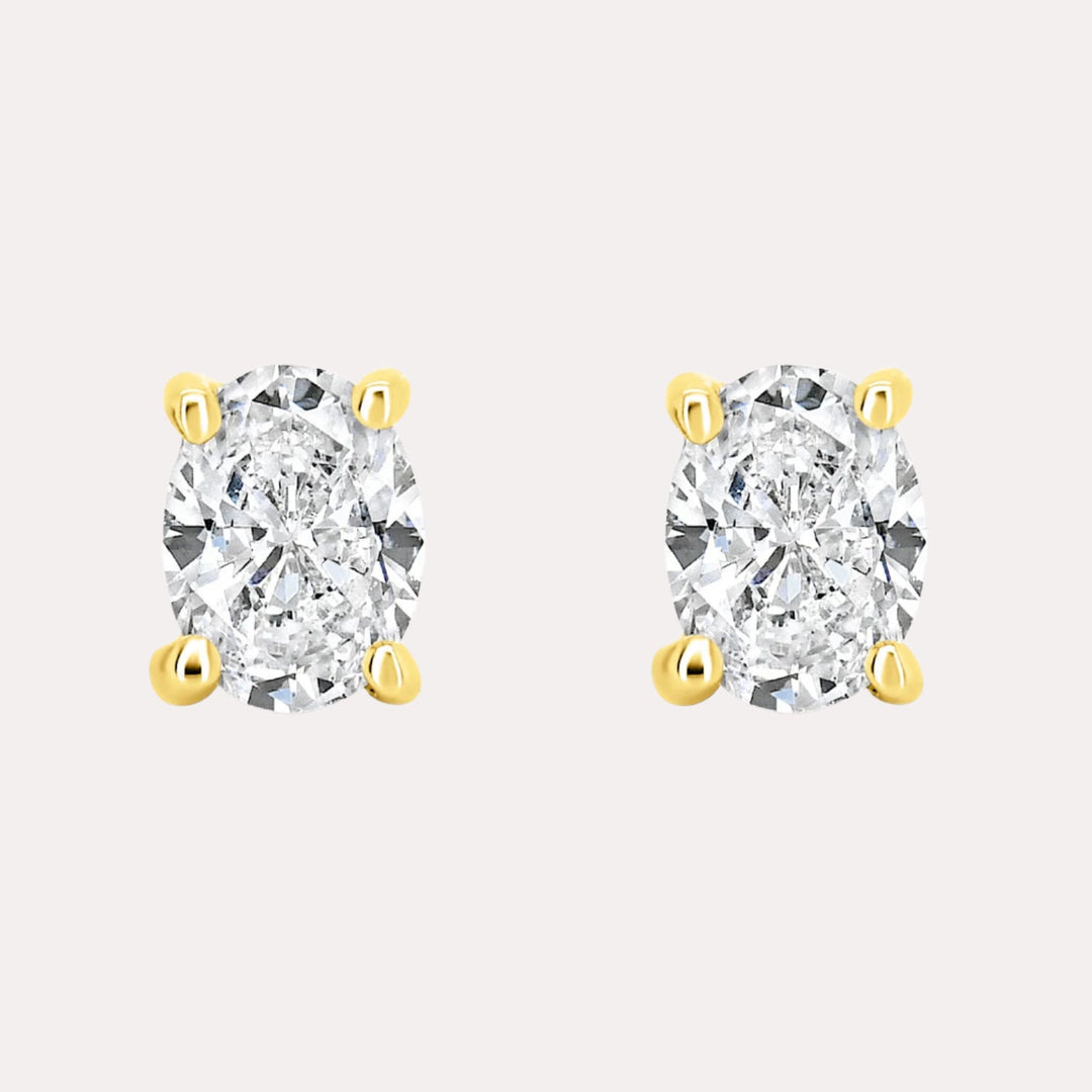 Oval 4 Claw Diamond Stud Earrings In 18K Gold - The Jewelyst. - Oval 4 Claw Diamond Stud Earrings In 18K Gold