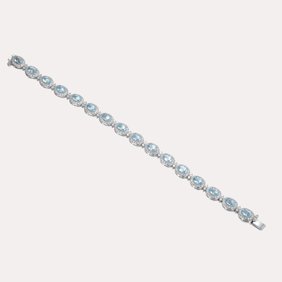Oval Cut Aquamarine & Diamond Halo Tennis Bracelet In 18K Gold - The Jewelyst. - Oval Cut Aquamarine & Diamond Halo Tennis Bracelet In 18K Gold