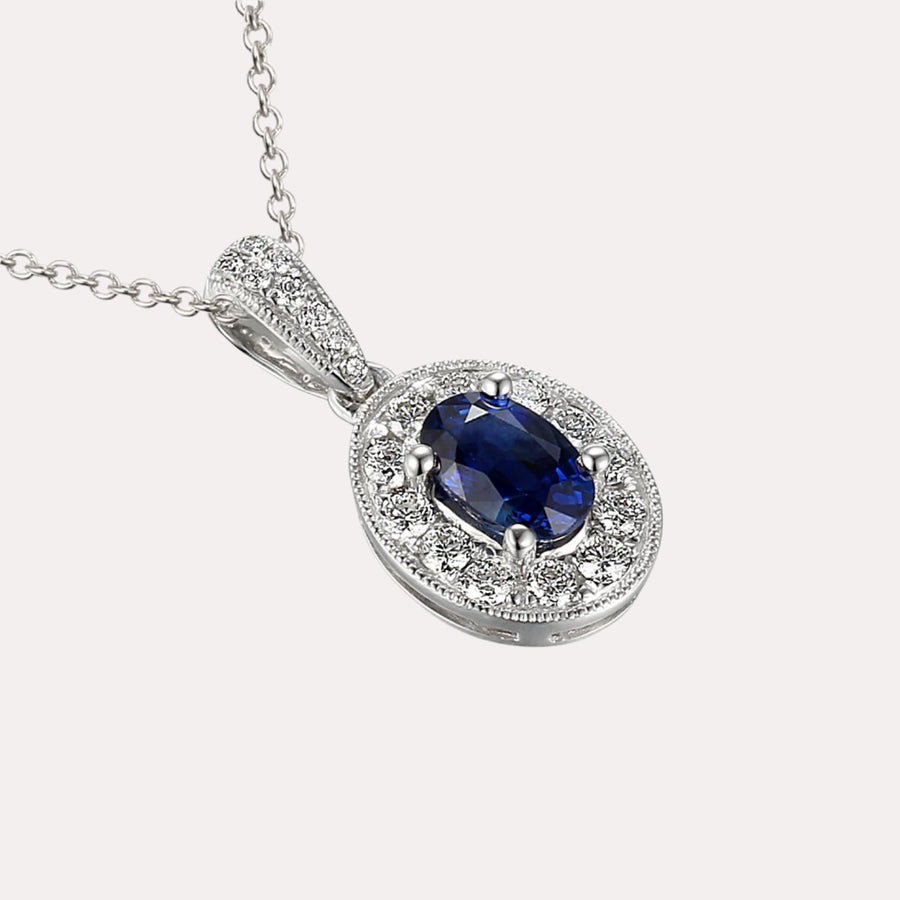 Oval Cut Blue Sapphire Halo Pendant Necklace In 18K Gold - The Jewelyst. - Oval Cut Blue Sapphire Halo Pendant Necklace In 18K Gold