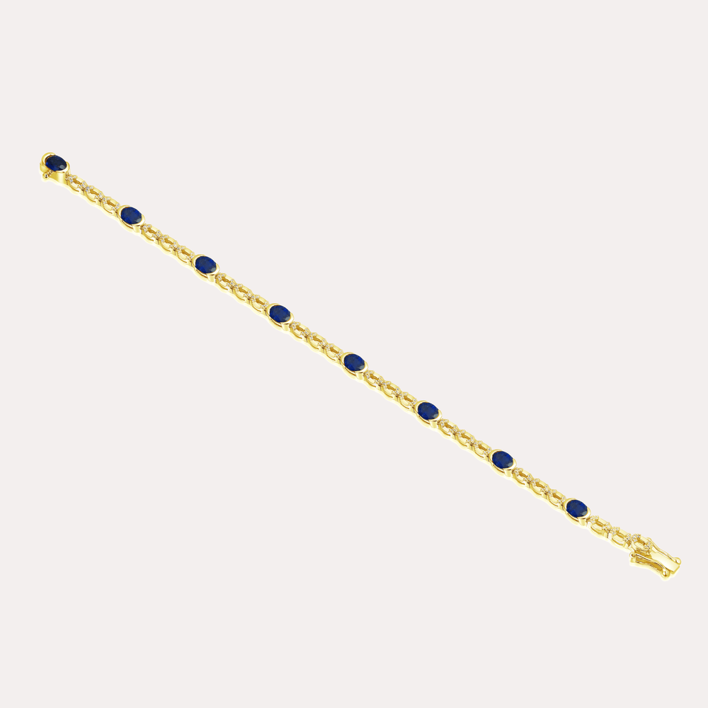 Oval Cut Blue Sapphire Rubover Set Tennis Bracelet In 18K Gold - The Jewelyst. - Oval Cut Blue Sapphire Rubover Set Tennis Bracelet In 18K Gold