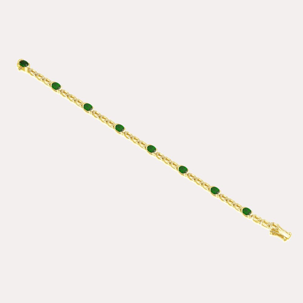 Oval Cut Emerald Rubover Set Tennis Bracelet In 18K Gold - The Jewelyst. - Oval Cut Emerald Rubover Set Tennis Bracelet In 18K Gold