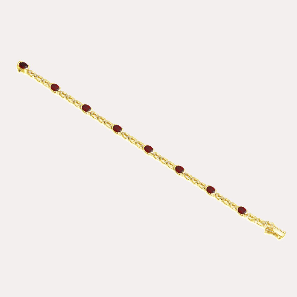 Oval Ruby Tennis Rubover Set Bracelet In 18K Gold - The Jewelyst. - Oval Ruby Tennis Rubover Set Bracelet In 18K Gold