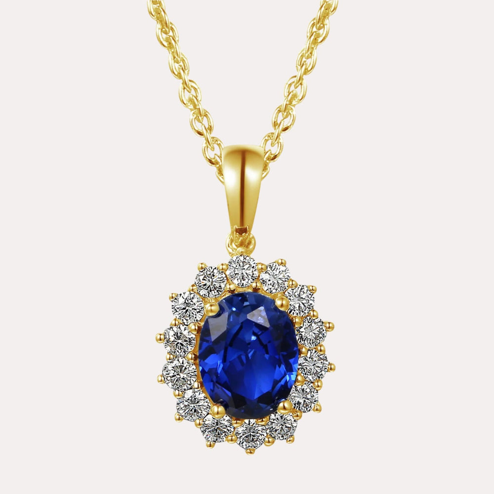 Oval Shape Blue Sapphire Halo Cluster Pendant Necklace In 18K Gold - The Jewelyst. - Oval Shape Blue Sapphire Halo Cluster Pendant Necklace In 18K Gold