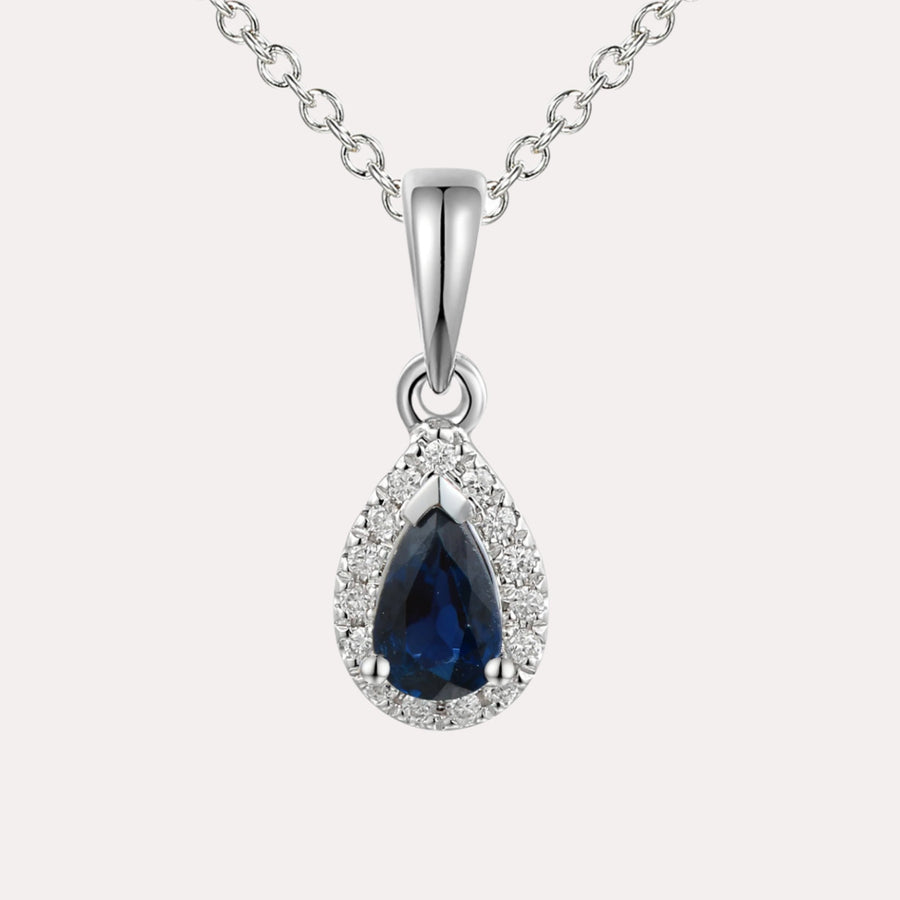 Pear Blue Sapphire Halo Pendant Necklace In 18K Gold - The Jewelyst. - Pear Blue Sapphire Halo Pendant Necklace In 18K Gold