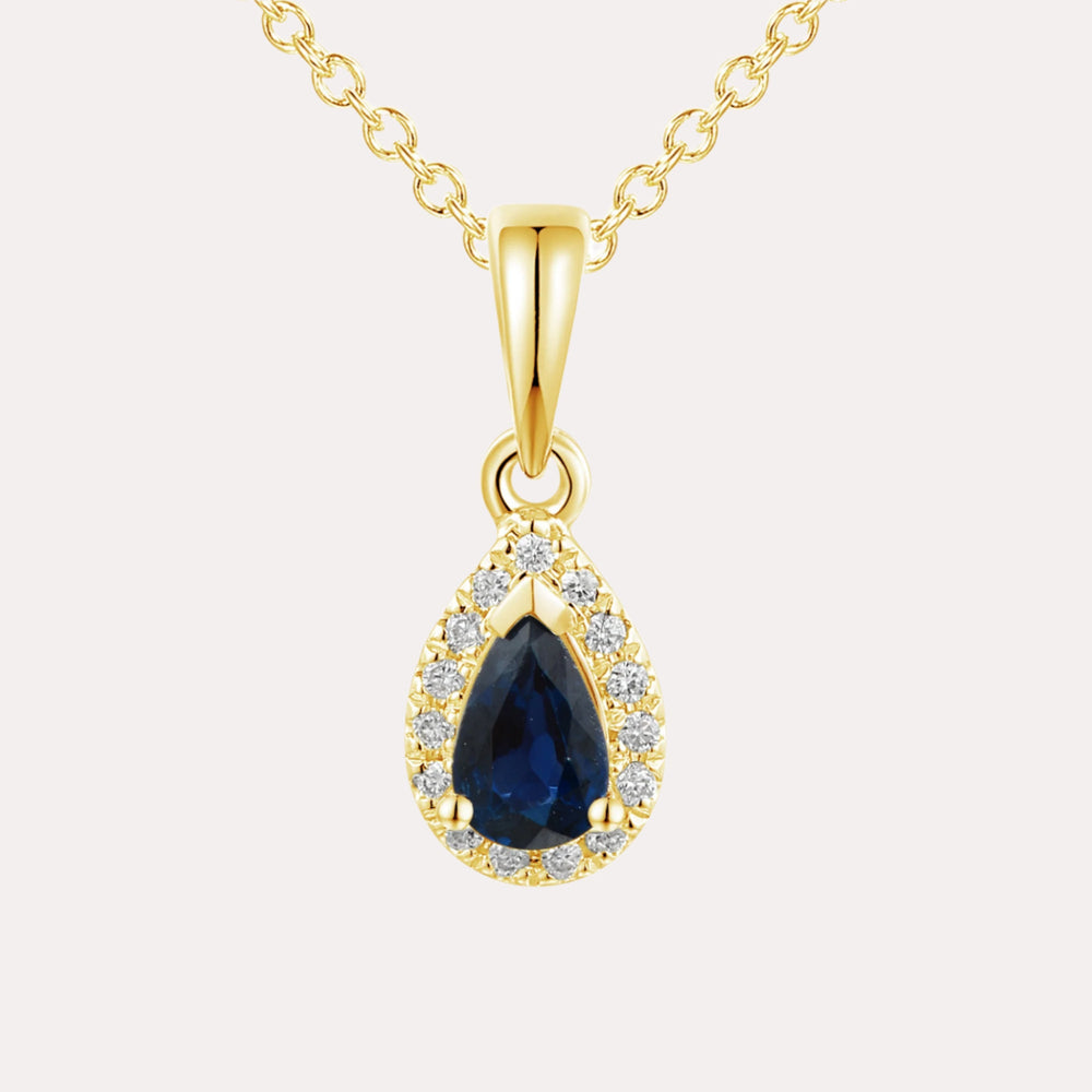 Pear Blue Sapphire Halo Pendant Necklace In 18K Gold - The Jewelyst. - Pear Blue Sapphire Halo Pendant Necklace In 18K Gold
