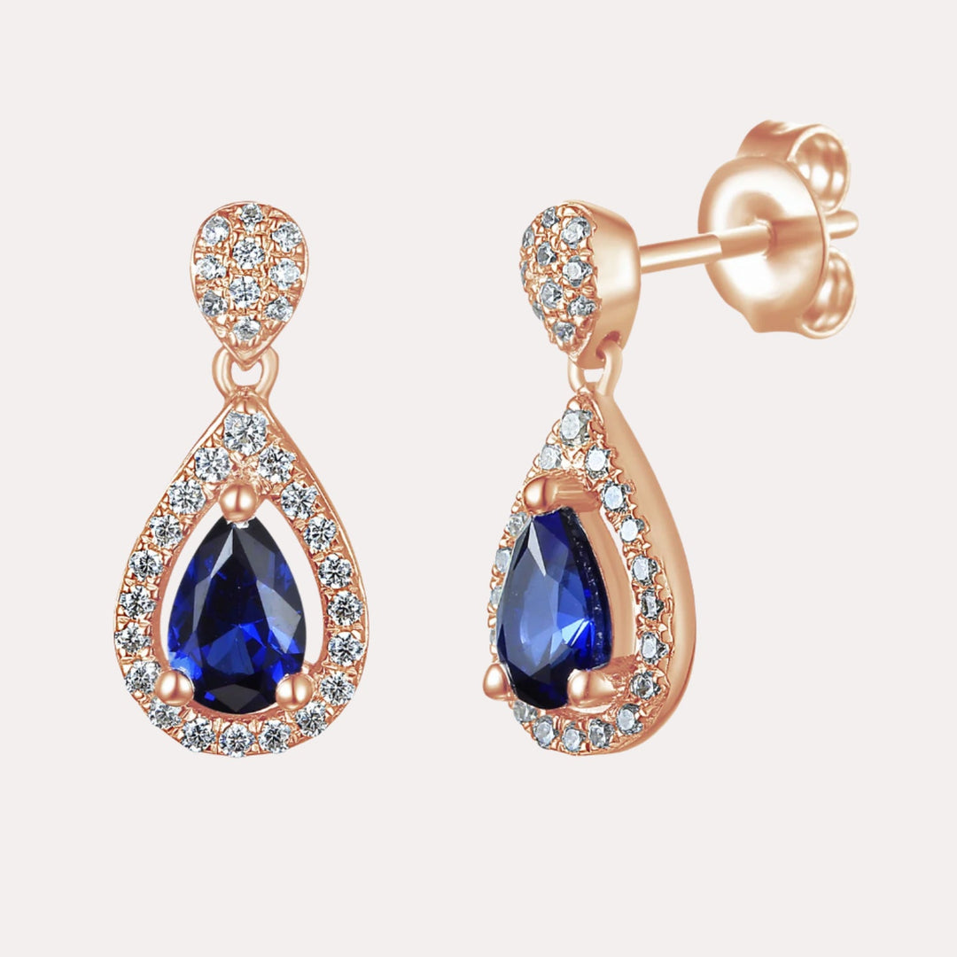 Pear Shape Blue Sapphire Halo Drop Earrings In 18K Gold - The Jewelyst. - Pear Shape Blue Sapphire Halo Drop Earrings In 18K Gold