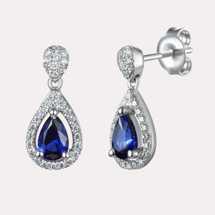 Pear Shape Blue Sapphire Halo Drop Earrings In 18K Gold - The Jewelyst. - Pear Shape Blue Sapphire Halo Drop Earrings In 18K Gold