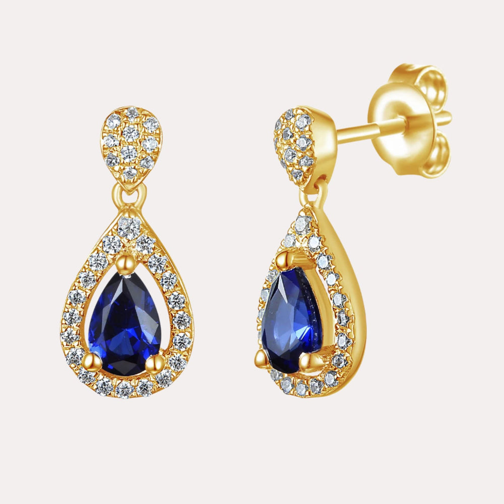 Pear Shape Blue Sapphire Halo Drop Earrings In 18K Gold - The Jewelyst. - Pear Shape Blue Sapphire Halo Drop Earrings In 18K Gold