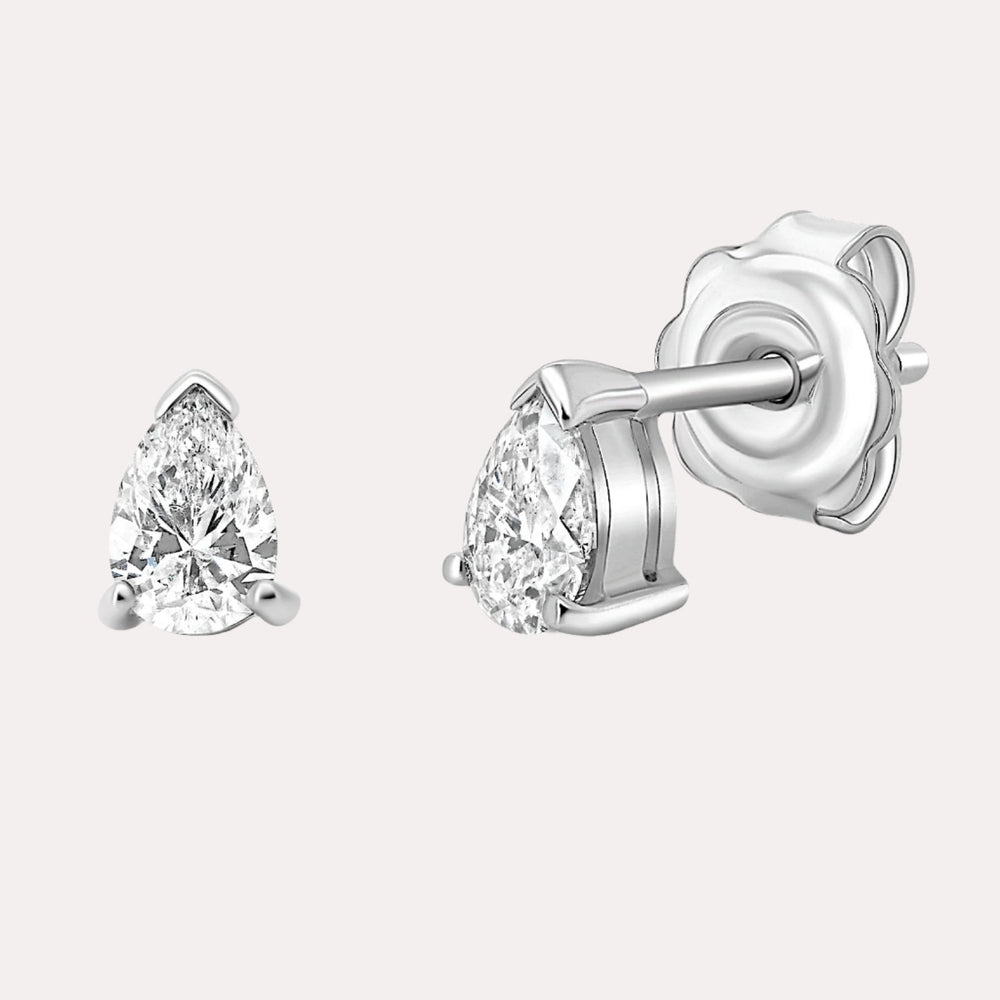 Pear Shape Diamond Stud Earrings In 18K Gold - The Jewelyst. - Pear Shape Diamond Stud Earrings In 18K Gold