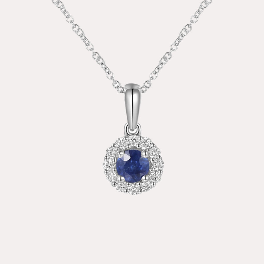 Round Blue Sapphire & Diamond Halo Pendant Necklace In 18K Gold - The Jewelyst. - Round Blue Sapphire & Diamond Halo Pendant Necklace In 18K Gold