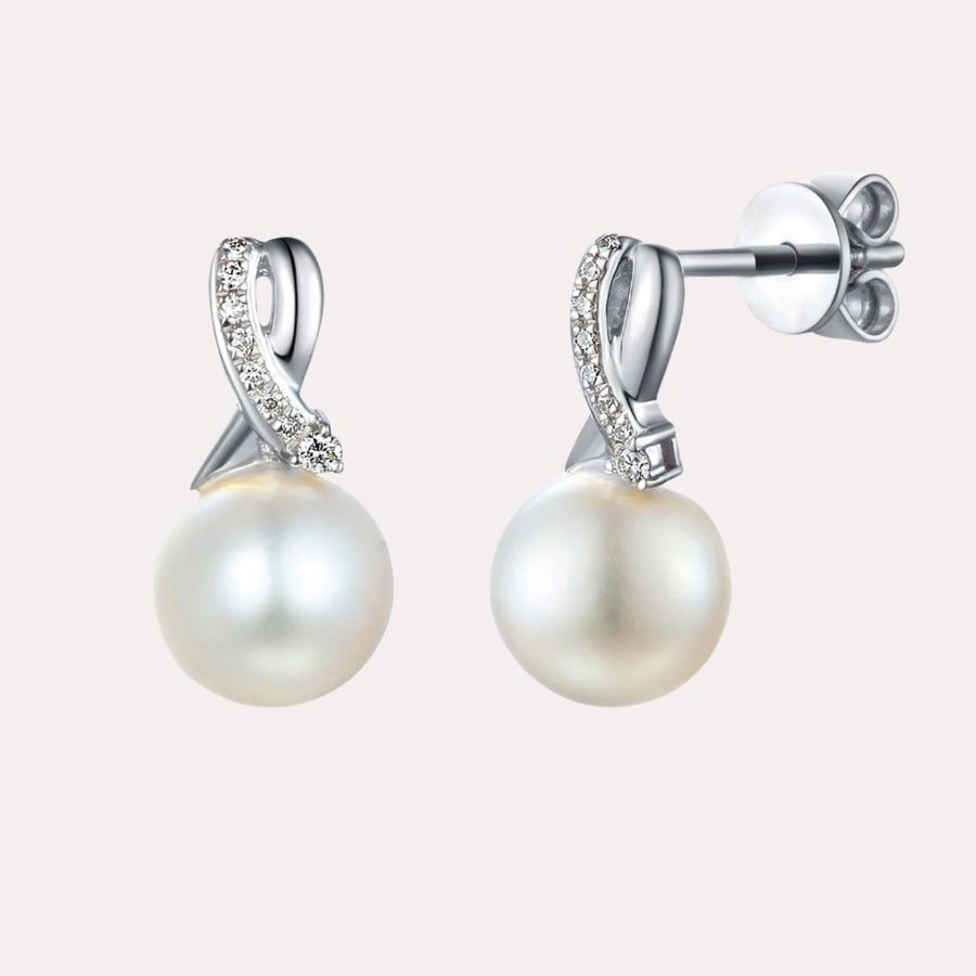 Round Pearl & Diamond Ribbon Stud Earrings In 18K Gold - The Jewelyst. - Round Pearl & Diamond Ribbon Stud Earrings In 18K Gold